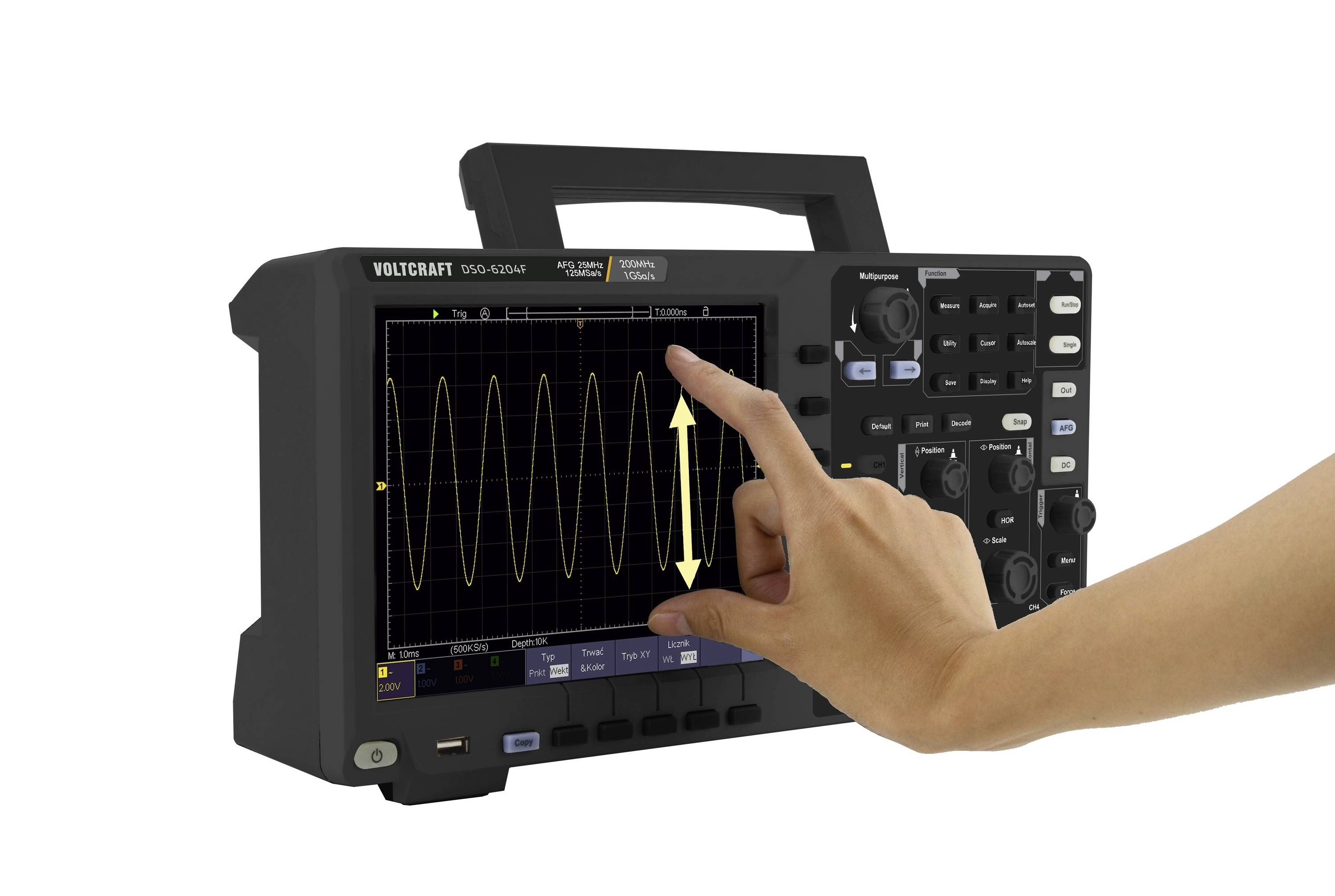 A hand is operating a digital oscilloscope and pointing to a wave-shaped display on the screen.