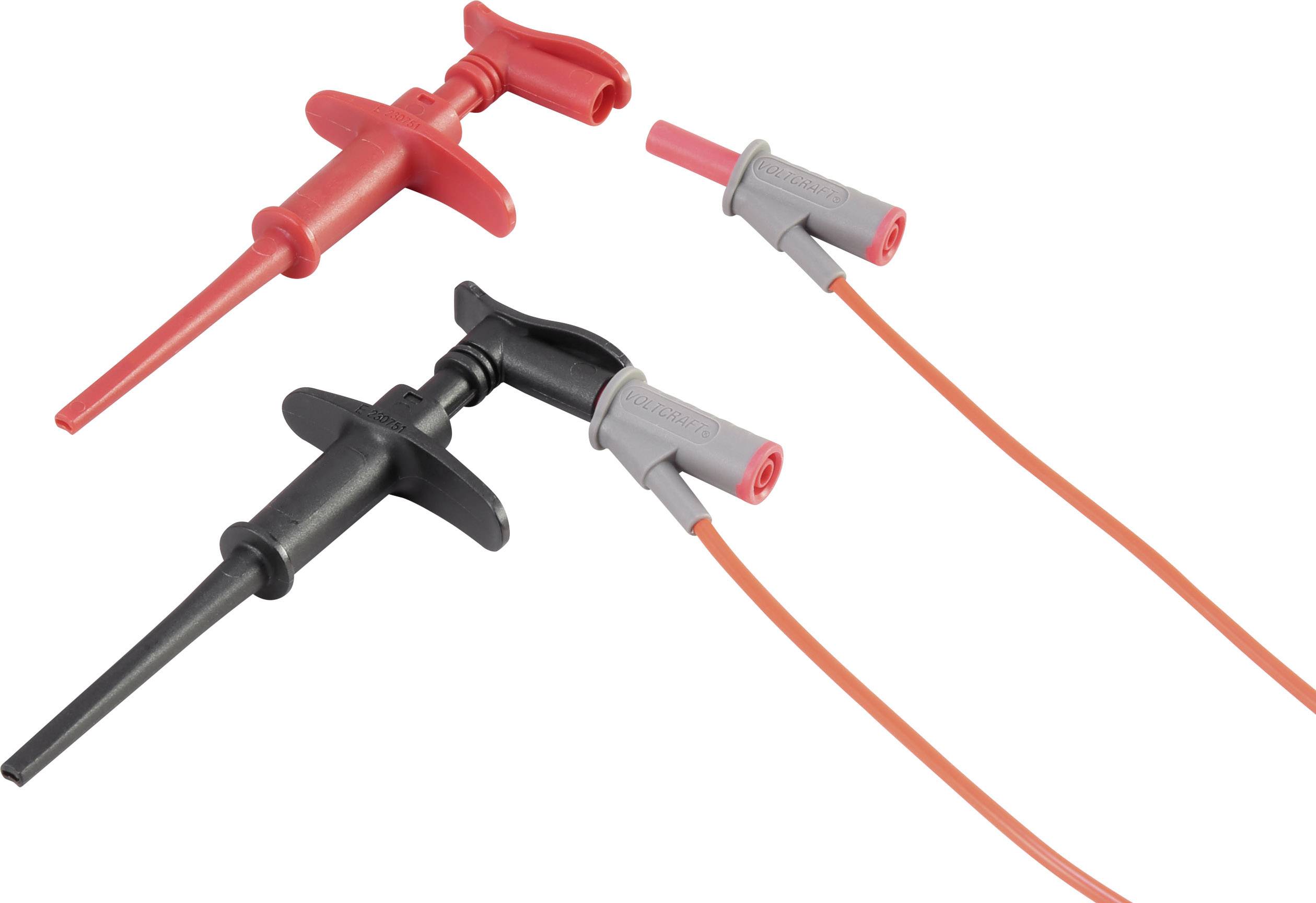 Two crocodile clips, one red and one black, with connecting cables. They are frequently used for electrical testing purposes.