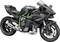 Black sports motorbike with green accents, powerful engine, sleek design, suitable for high speeds and sporty riding.