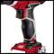 Cordless drill in close-up, with black and red grip design.