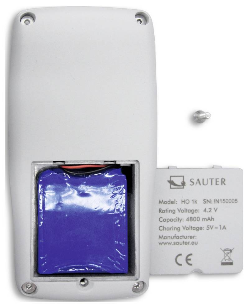 Back of an electronic device with the battery cover removed. Battery and label with technical details are visible.