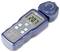 Digital light meter with removable sensor opening, displaying 207 fc. Used for measuring light intensity in photography or lighting design.