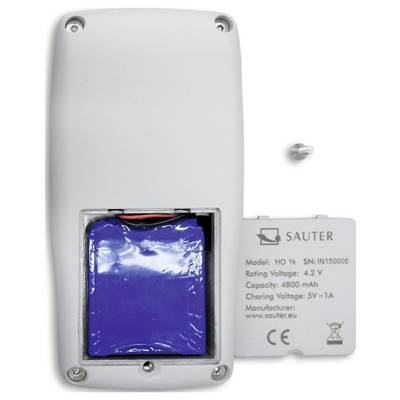 Back of a white device with an open battery compartment. A blue battery is visible. The nameplate displays technical specifications.