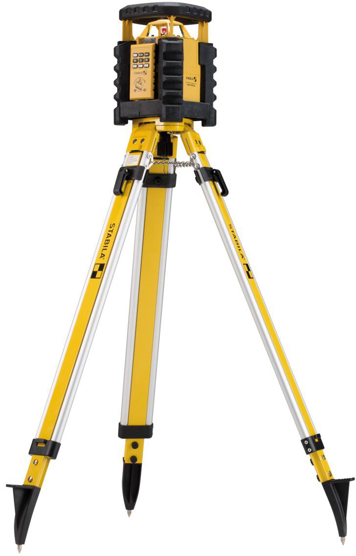 Yellow laser measuring device on a tripod, used for precise measurement and alignment in construction.