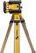 Yellow construction tripod with mounted laser measuring device. 'Stabila' logo visible on the tripod.