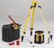Construction site laser device set with tripod, receiver, scale, safety glasses and transport case on grey background.