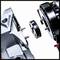 Machine parts in close-up, showing the precise connection of two components; emphasis on metal pins and disc.