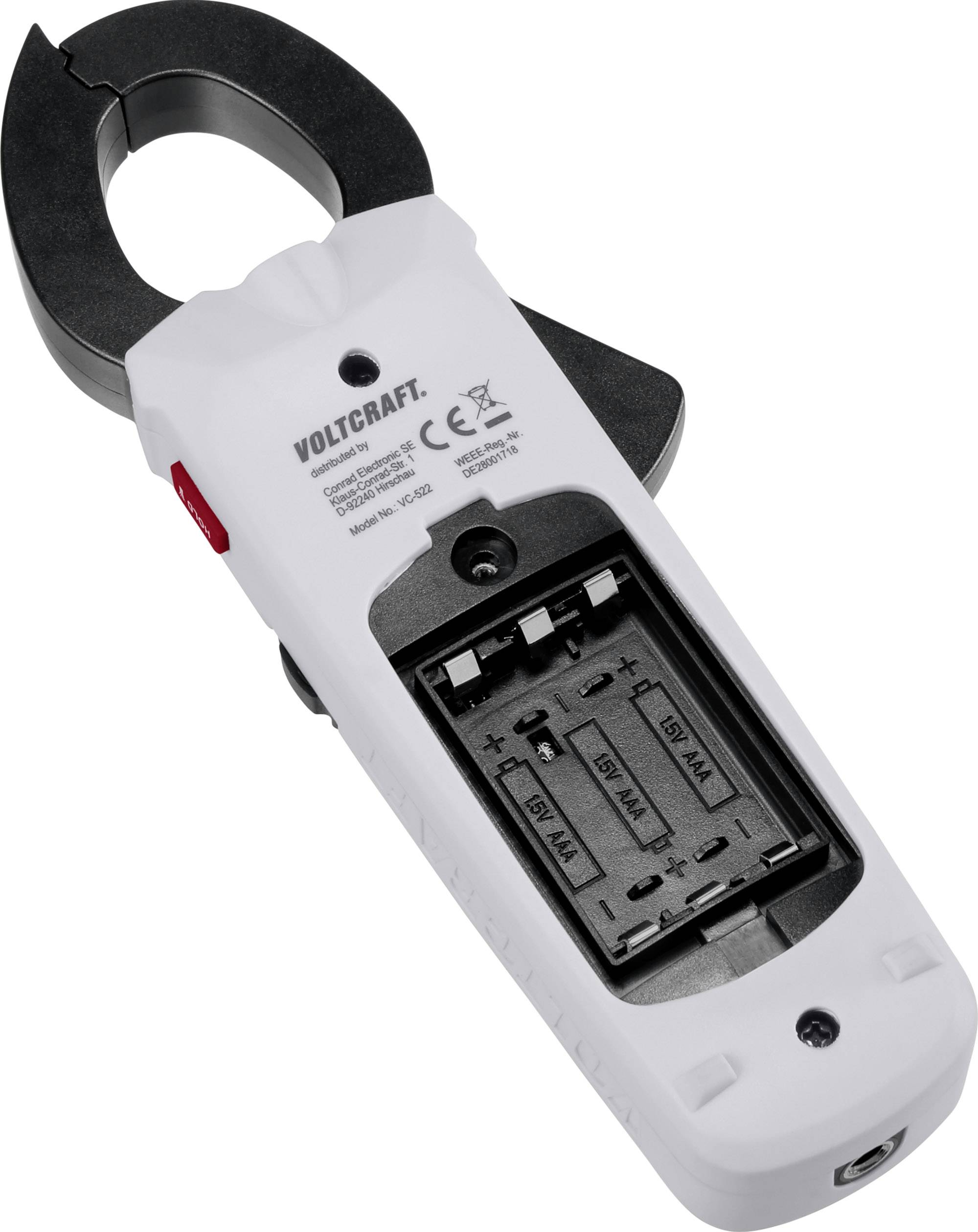 An opened white measuring device with a visible AA battery compartment and technical labelling; specifically designed for electrical measurements.
