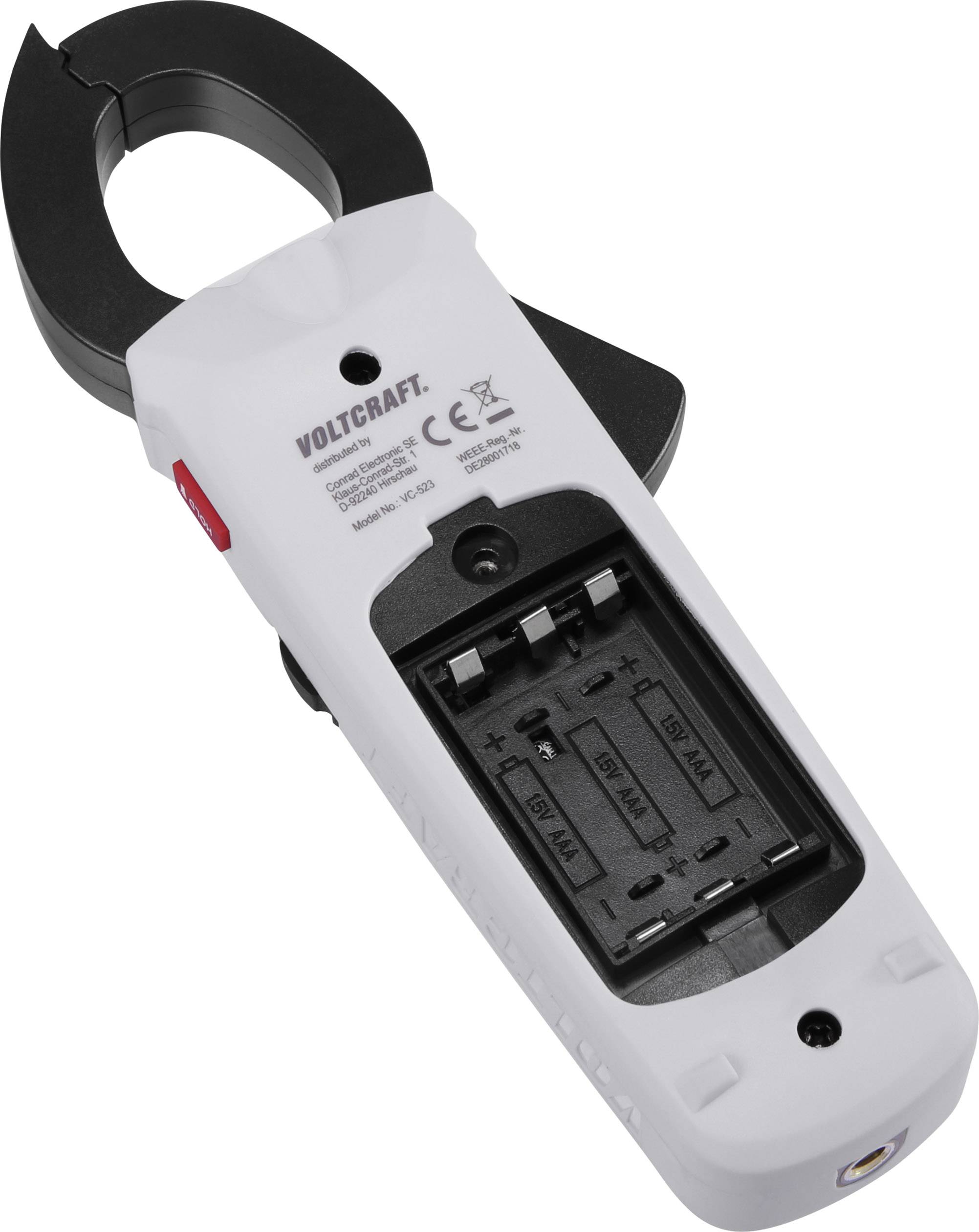 Rear view of a white digital clamp meter with an open battery compartment and some visible technical markings.