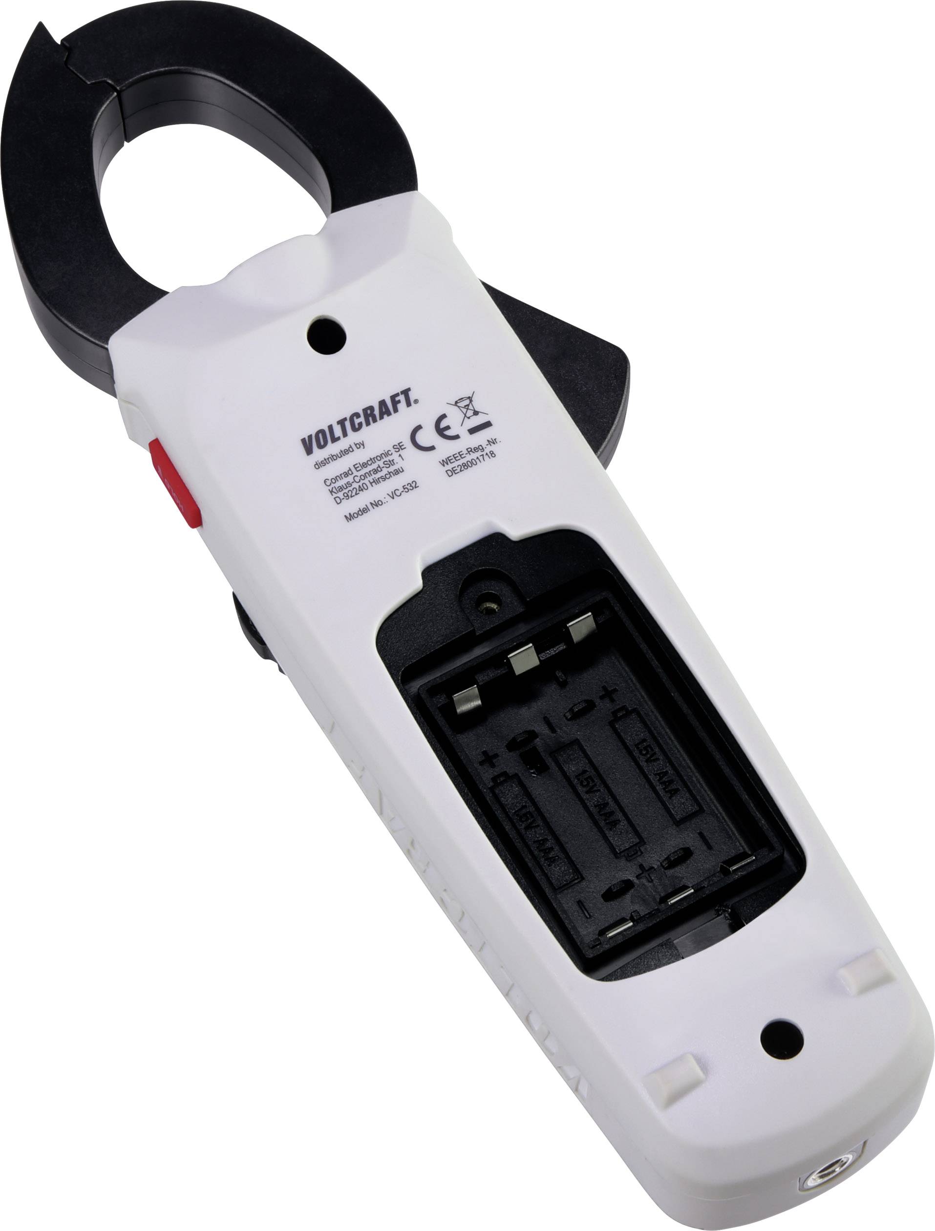 An electrical measuring device with an open battery compartment, marked with 'Voltcraft'. Battery compartment for two AA batteries visible.