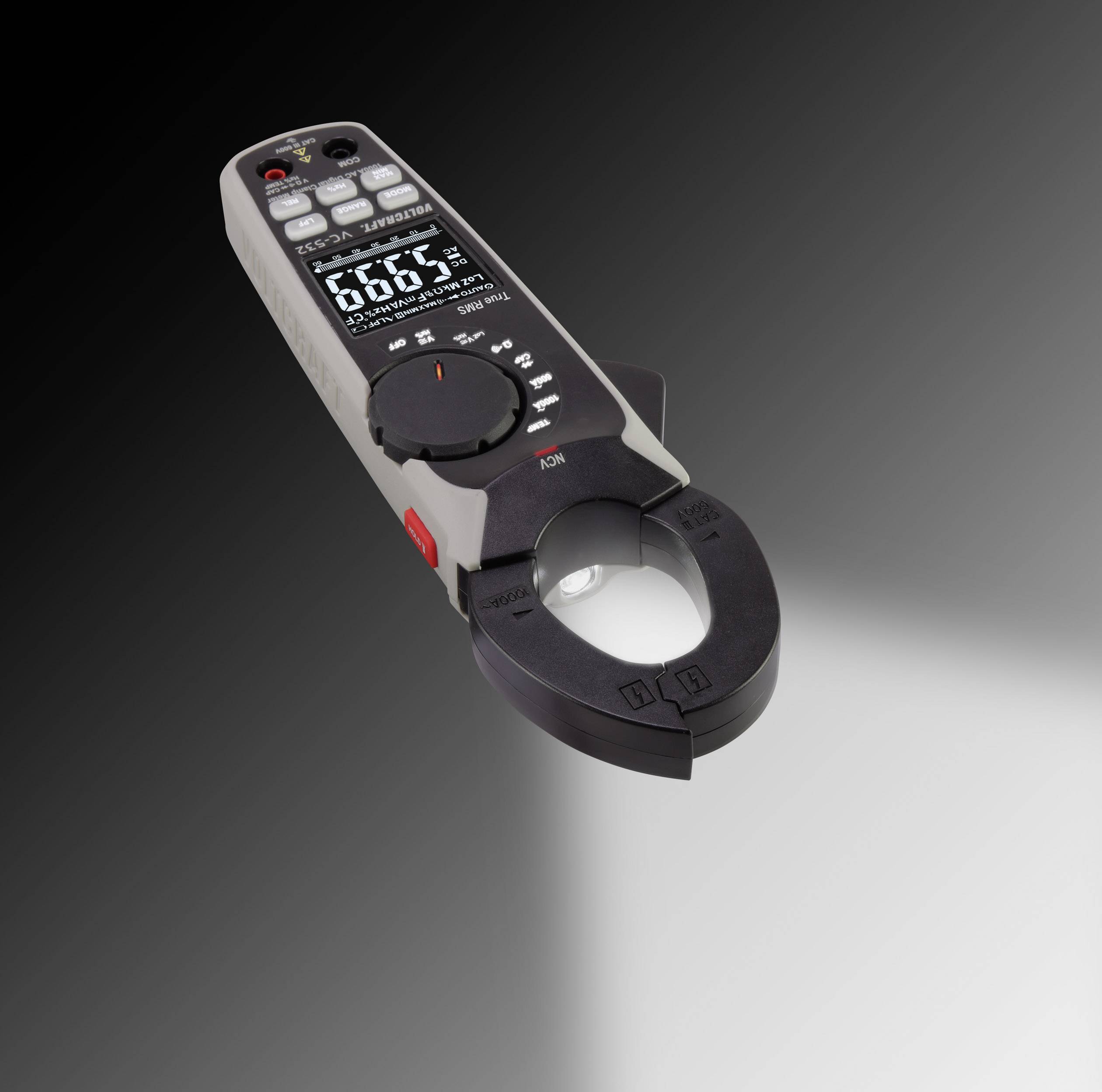 A digital ammeter with clamp function displays measurement values on a screen, suitable for electrical measurements.