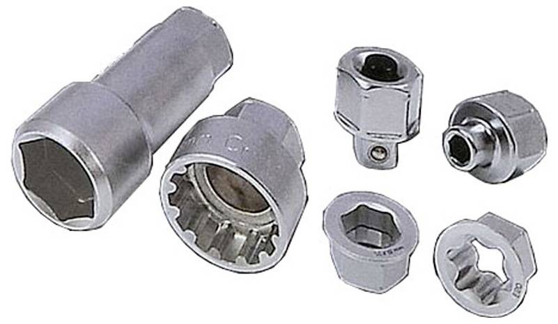 Six different metal socket adapters in various sizes and shapes, arranged on a white background.