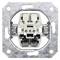 Back of light switch in metal frame, with screw terminals and plastic components.