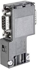 'Grey electrical adapter with metal connectors and embossed arrows indicating flow direction. Used for connecting devices.'