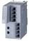 Grey electronic device with multiple slots and ports, possibly a network or communication module.