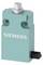 A turquoise Siemens micro-switch with two mounting holes and one black and one silver contact.