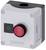 A grey plastic casing with a large red emergency button and a small black button on the front.