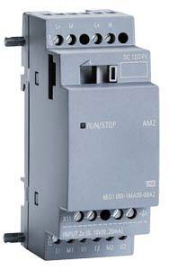 A grey electrical module housing with multiple connections and switches, marked with 'RUN/STOP' and technical specifications.