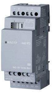 A grey electrical component with multiple connections and the inscription 'RUN/STOP AM2 RTD'. It appears to be a switching device.