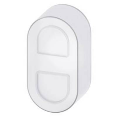 A white, oval light switch with two press surfaces, mounted on a wall.