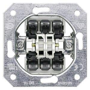 An electrical switch with multiple terminals and screws, mounted in a metal frame. Suitable for various wiring configurations in buildings.