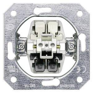 A metal switch frame with plastic components in the centre. Includes mounting holes for installation.