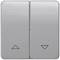 A double light switch with up and down arrow symbols, possibly for blinds or curtains.