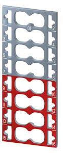 The image shows a grid with semi-circular cutouts for cable organisation. The upper half is grey, the lower half marked in red. Numbers from 0 to 16 are placed along the sides.