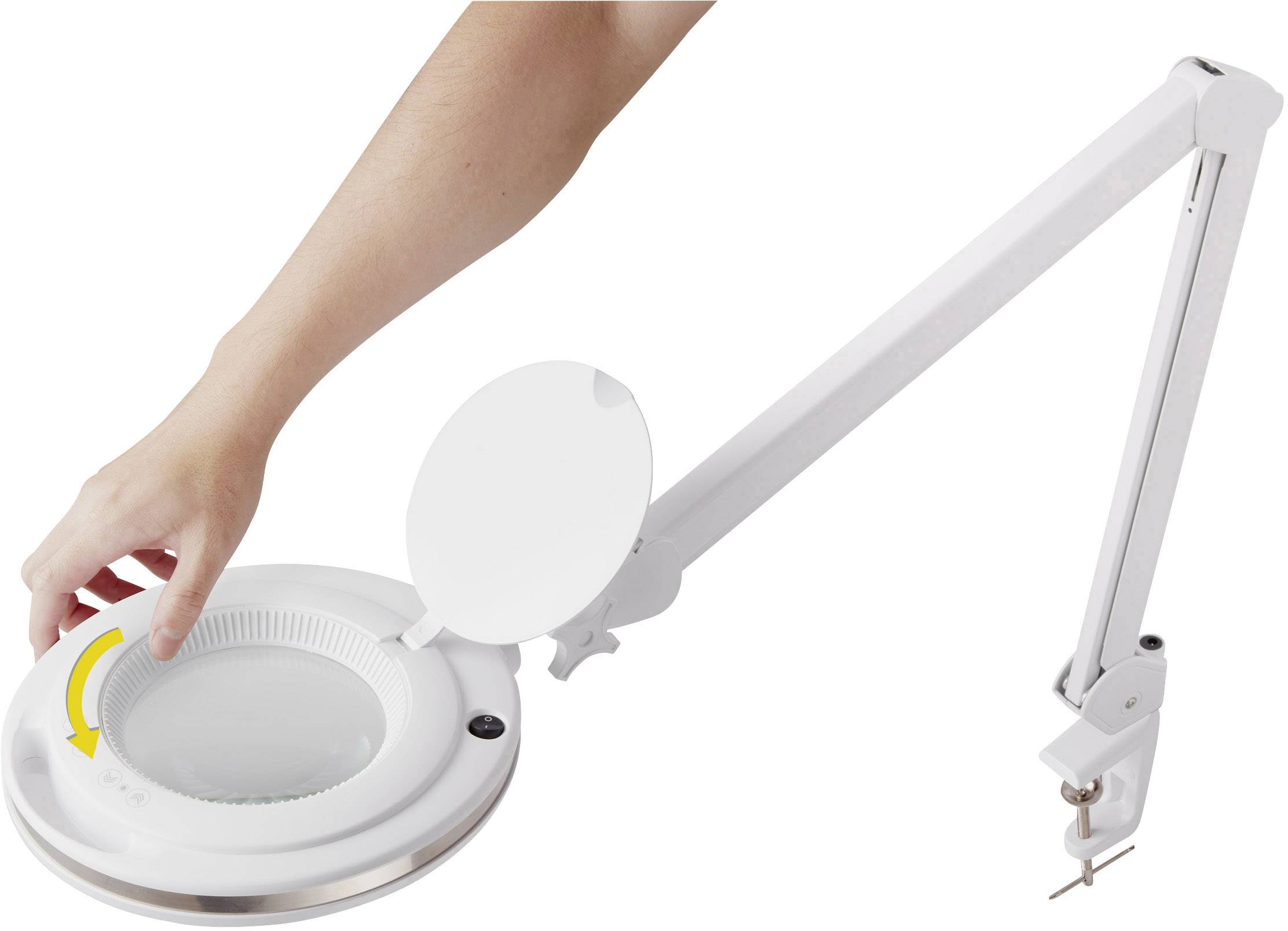 A person is adjusting a white, magnifying lamp with a flexible arm by opening the lamp shade.