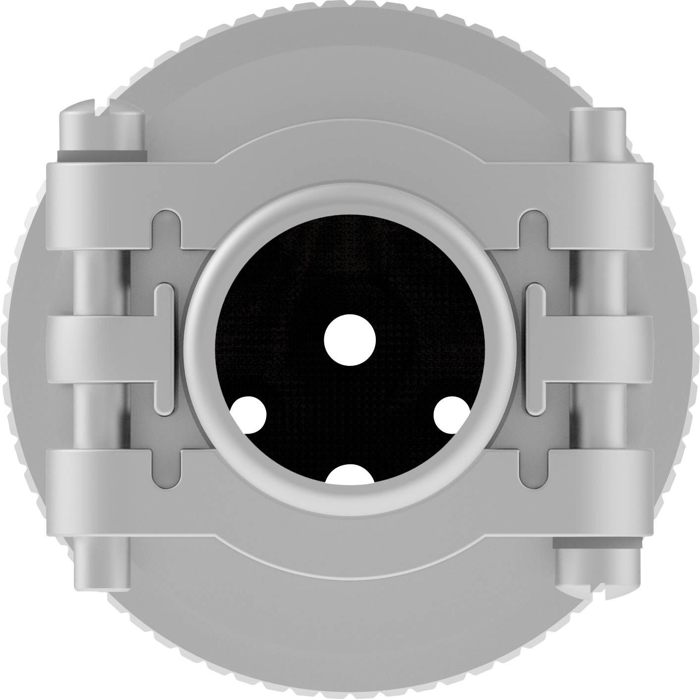 'Close-up of a circular metal connection with five holes. The surface is grey and has serrated edges.'