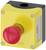 Yellow emergency stop button with a red cap, mounted on a plate. Used for emergency stopping in machinery or industrial plants.