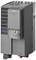 Grey Siemens SINAMICS frequency converter for industrial applications, showing ventilation slots and control elements on the front panel.