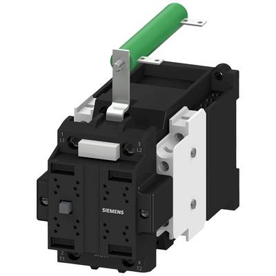 A black and white electrical switch with a green handle on the top, suitable for industrial applications.