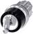 A silver and black round cylinder with an inserted key displays a locking system, with mechanical details highlighted.