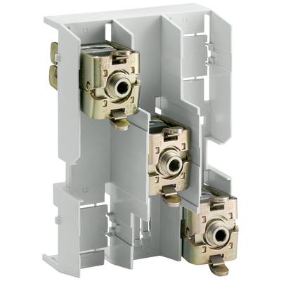 Grey-white fuse holders with three vertically arranged fuses, used for securing electrical connections in a control cabinet.