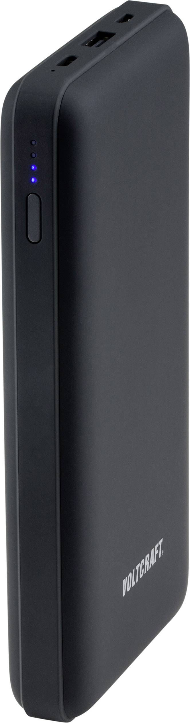 Black power bank with 'Voltcraft' inscription, showing four blue LED indicators, presumably for battery level display.