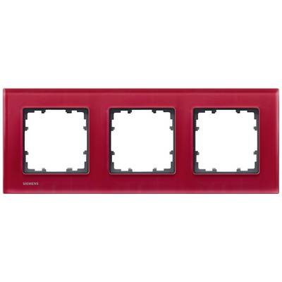 Red triple light switch frame by Siemens; empty, without switch inserts.