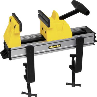 A yellow and black vice with 'Stanley' printed on it, mounted on a workbench, with two G-clamps.