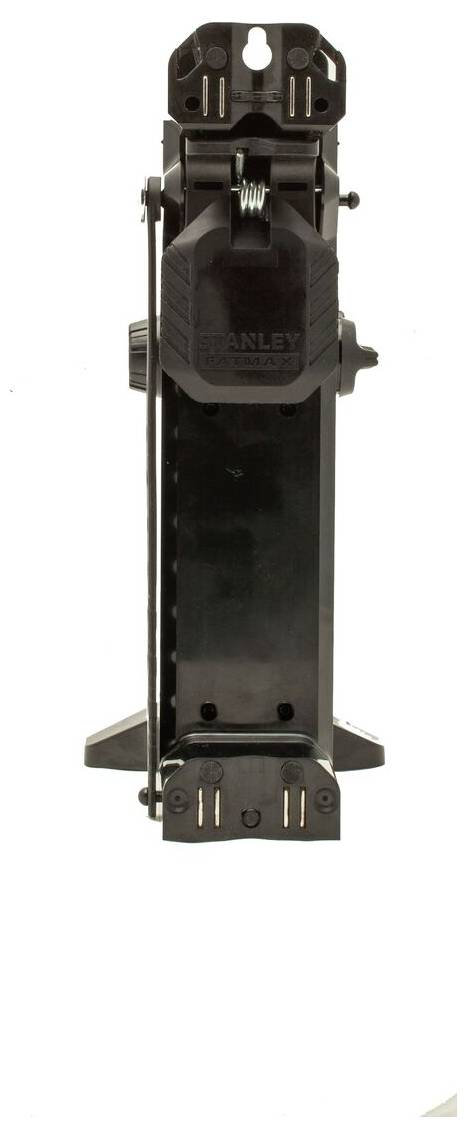 A black tool with metal and plastic components, vertically positioned, possibly a vice or a mounting bracket.