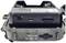 Close-up of an electronic device with ports on one side, including a USB port and a memory card slot.