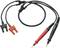 Black and red test lead set with two probes and plugs, used for electrical measurements in laboratories and workshops.