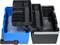 An opened, black and blue toolbox with two pull-out levels, displaying compartments for tools.