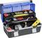 An opened toolbox with various tools and accessories. Contains screwdrivers, screws, adhesive tape, and a measuring cup.