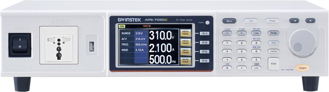 An electronic measuring instrument with a digital display shows numerical values for voltage, current, and frequency.