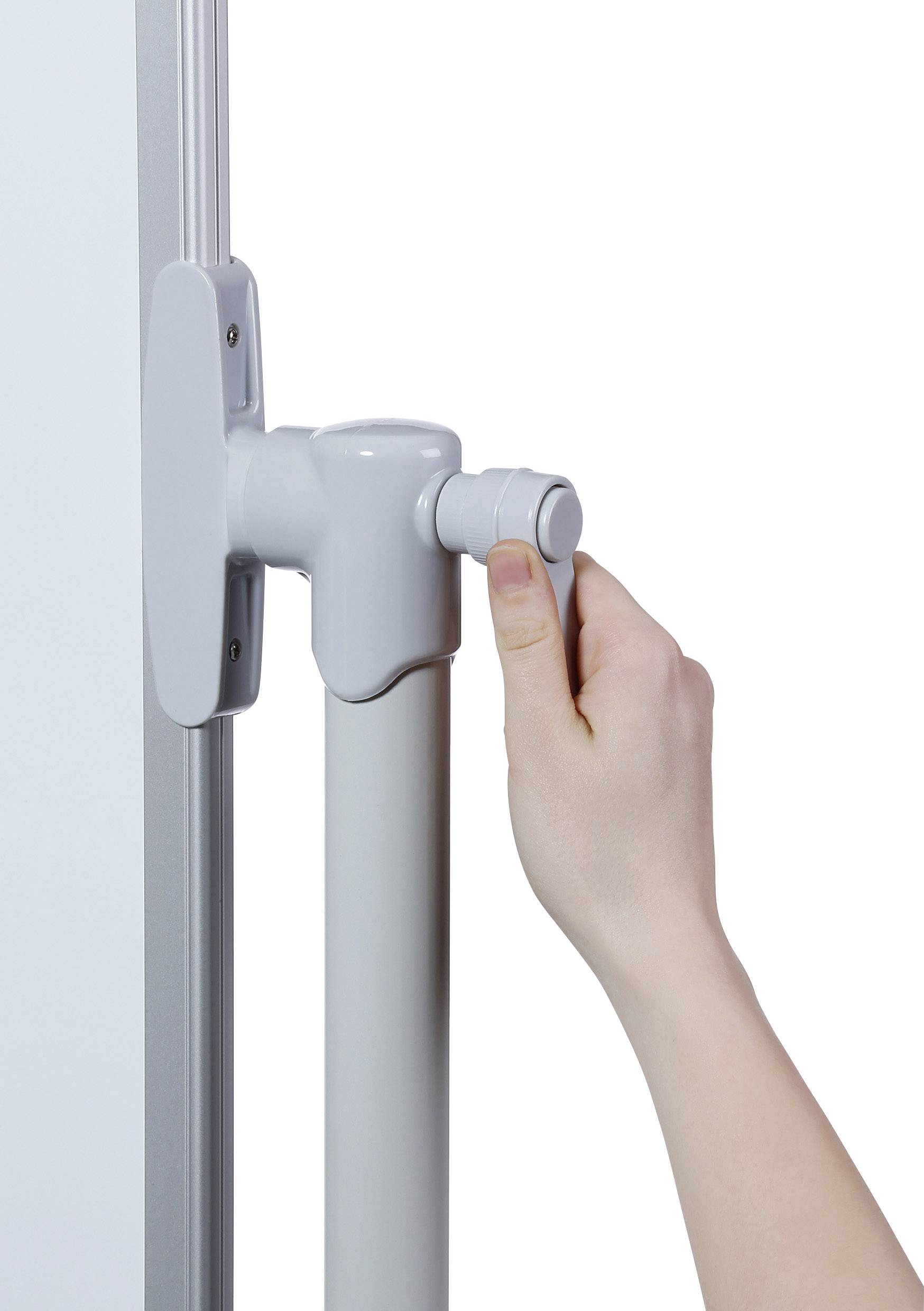 A hand is turning a grey rotary knob on a vertical pole, possibly for adjustment or securing.