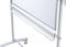 A movable whiteboard with a shelf and castors, suitable for presentations or meetings.