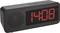 Black digital alarm clock with red illuminated display shows 14:08. A speaker is located to the left of the display.