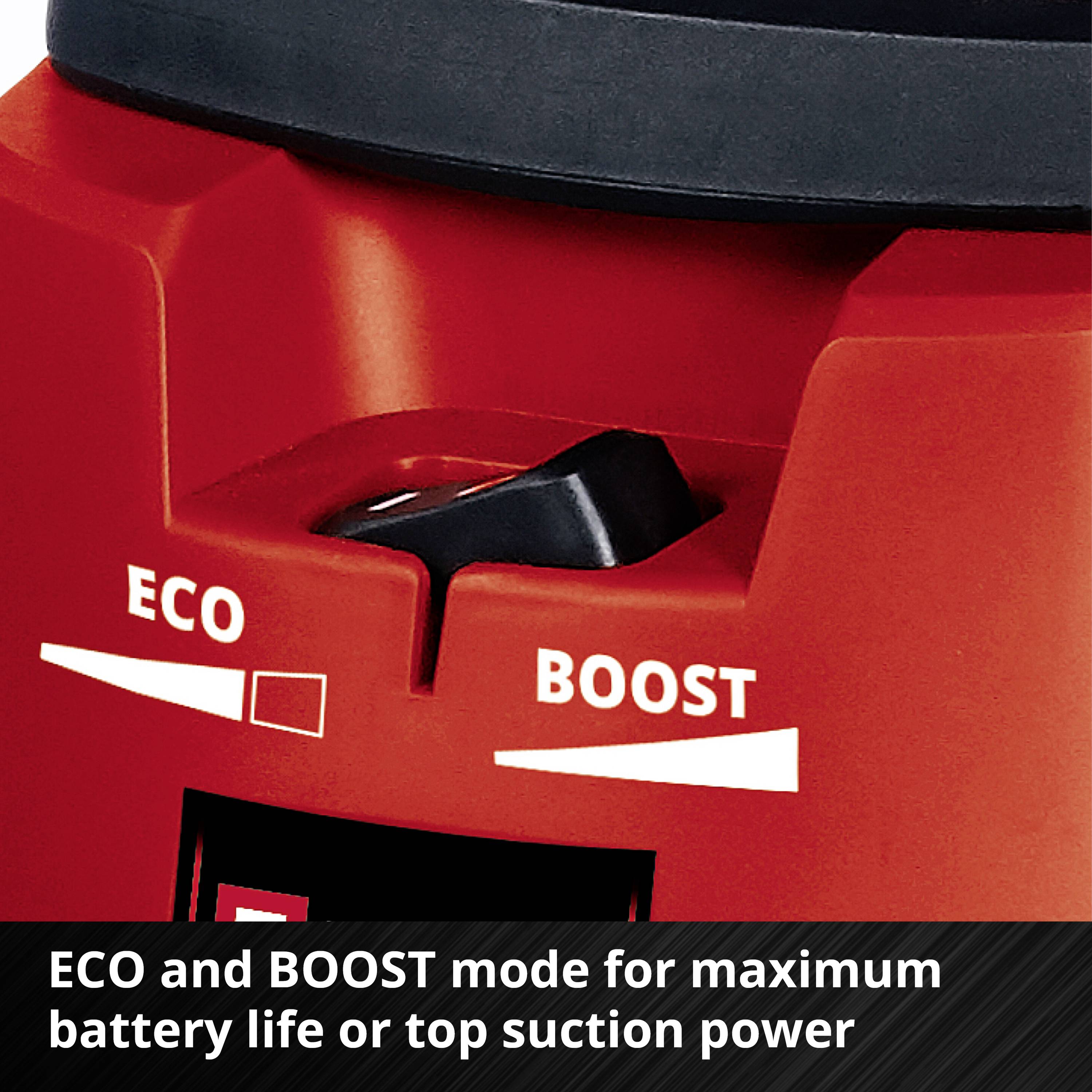 Red vacuum cleaner with a switch for 'ECO' and 'BOOST' modes, allowing selection between long battery life or maximum suction power.