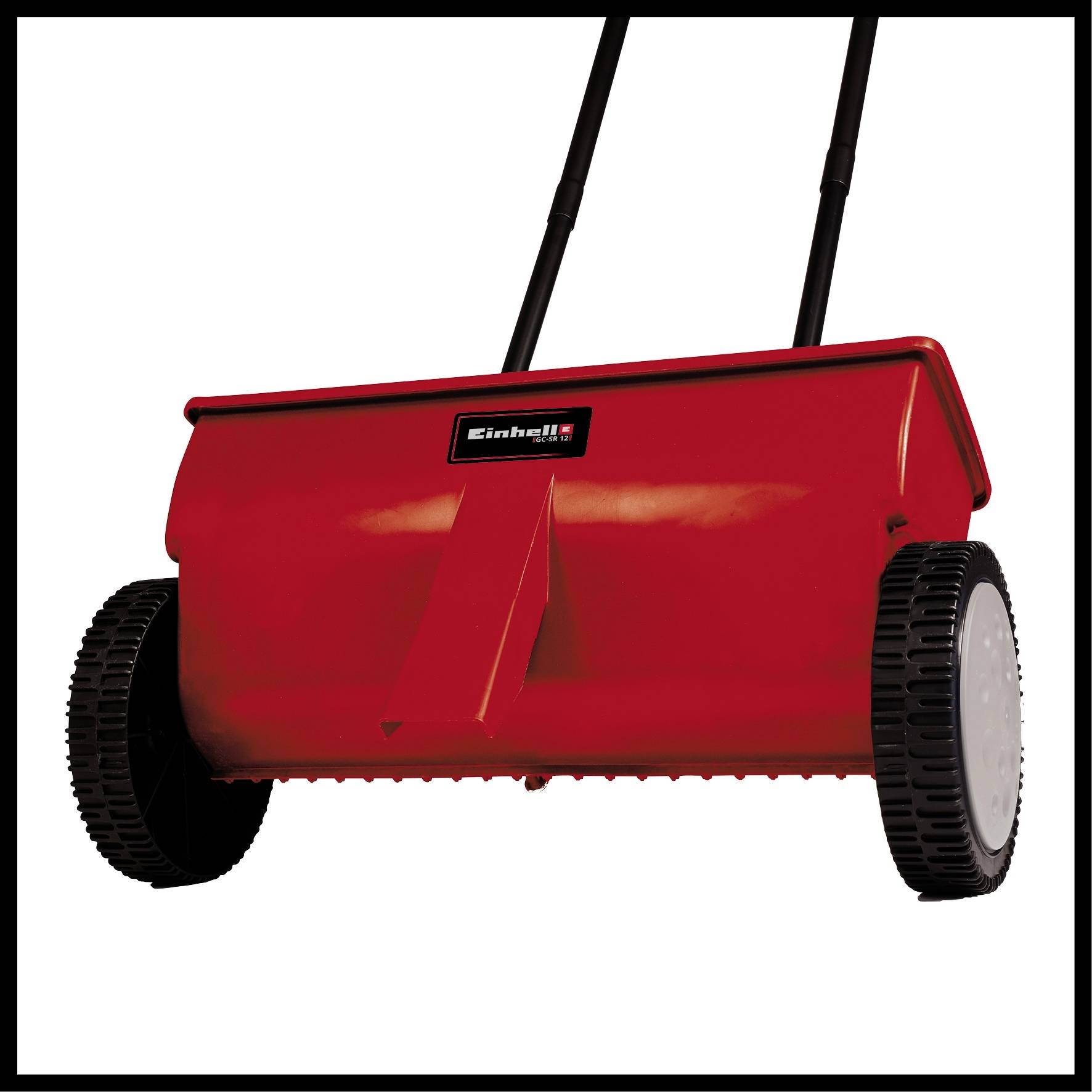 A red fertiliser spreader on wheels with two handles on top; used for even distribution of seeds or fertiliser in the garden.