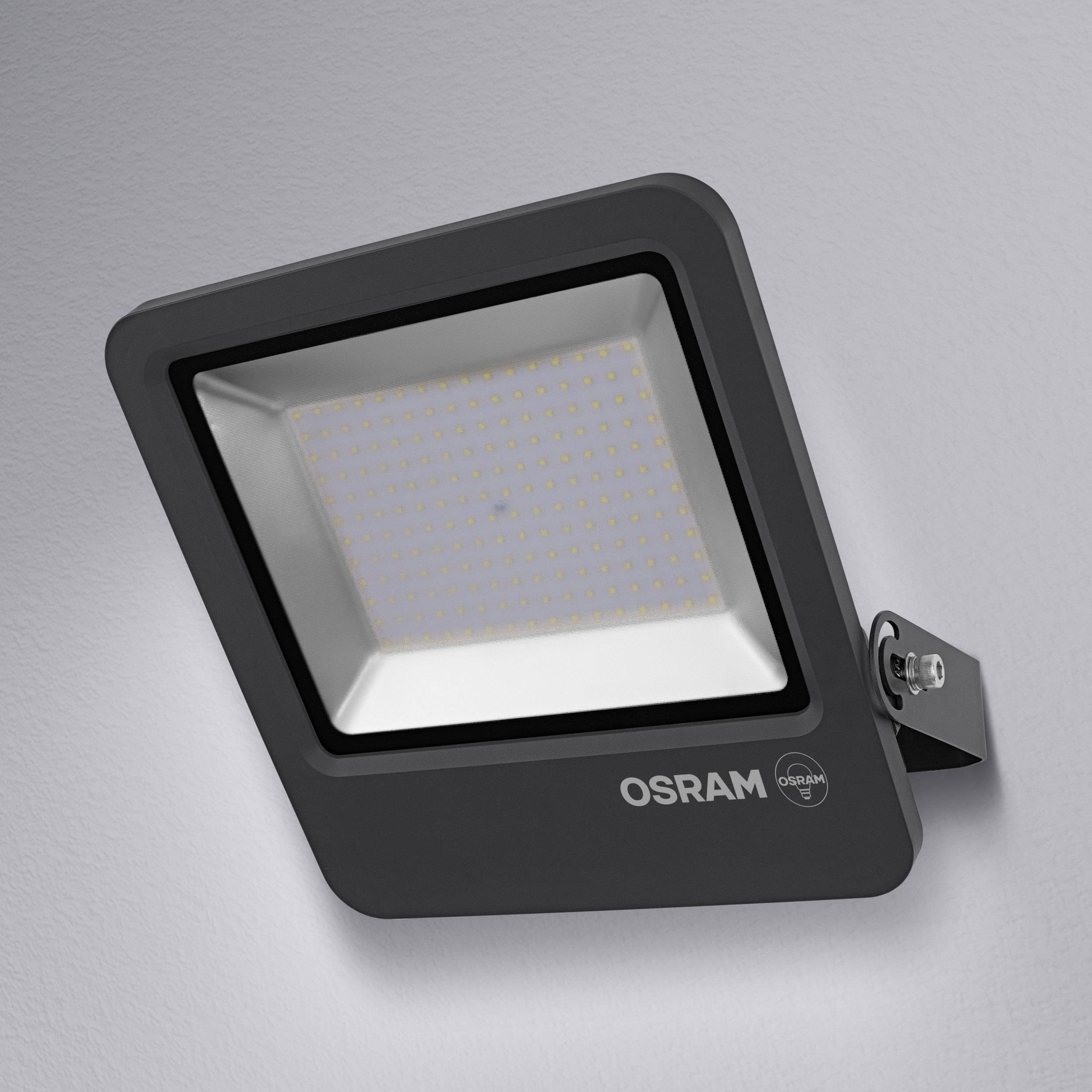 A square OSRAM LED floodlight mounted on a wall. The design is functional and modern, suitable for outdoor lighting.